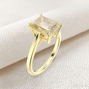 14K Gold Ring with Emerald Cut Center Stone